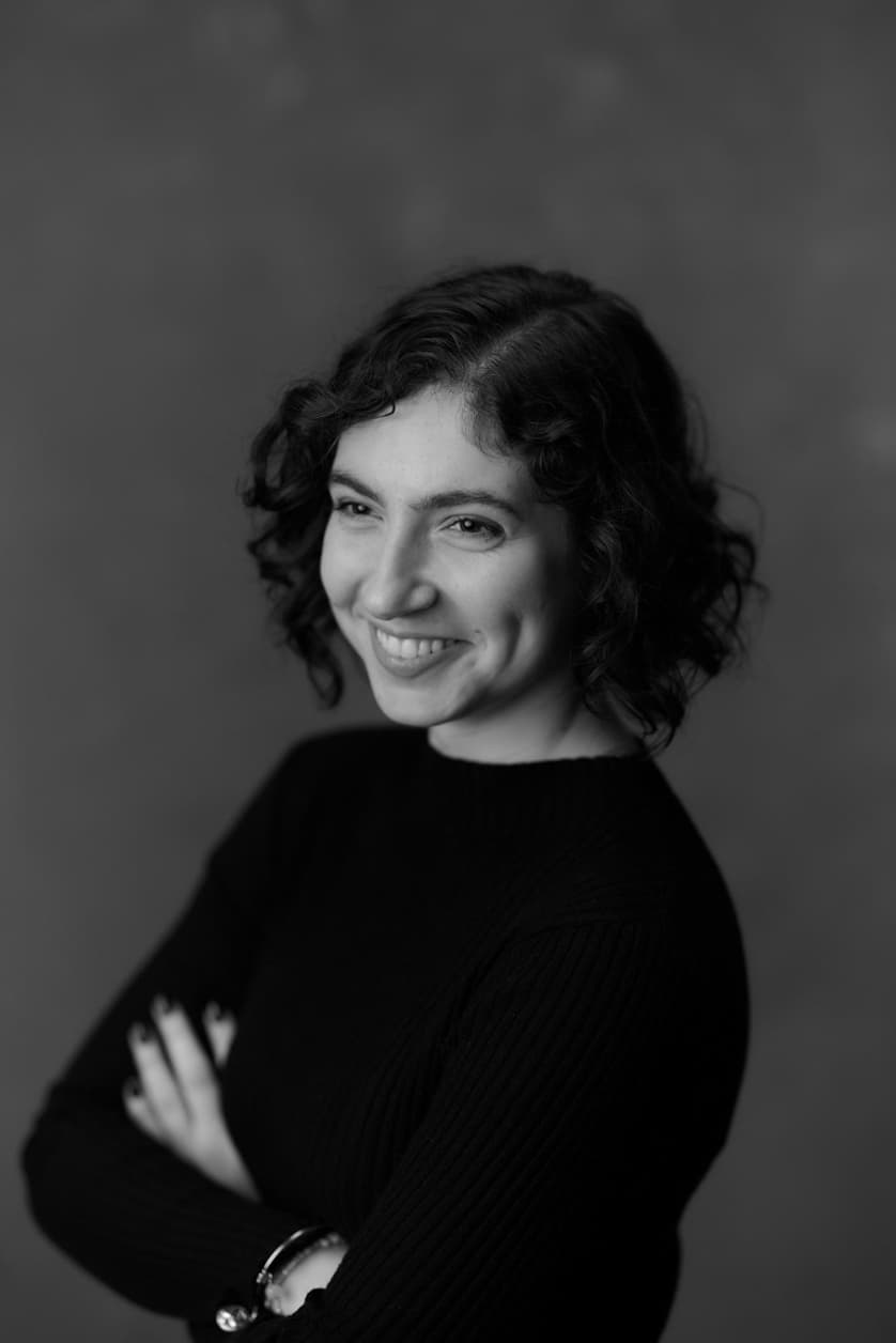 Photo of Kate Bemis looking toward the left side of the page